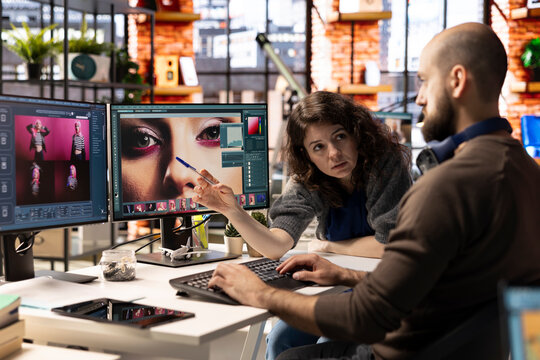 Photographers team collaborate on AI generated content using text to image tools. The editing software provides automation and advanced deep learning solutions for photo retouching.