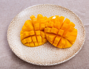 Nice refreshing diced mangoes served on plate with style