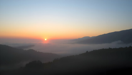 Obraz premium Serene Sunrise Over Misty Mountain Landscape Breathtaking View Nature Photography