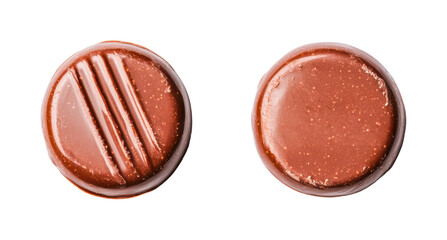 Fototapeta premium Close-up of two delicious round milk chocolate pieces, cut out