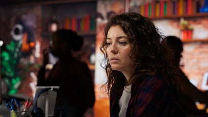 Employee working in innovative startup office using programming languages to build application. Software development agency IT specialist optimizing code, typing on computer keyboard, camera B closeup