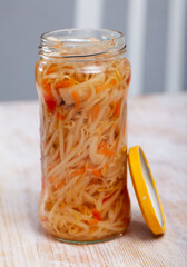 Close up of Chinese salad with sprouted mung beans in glass jar