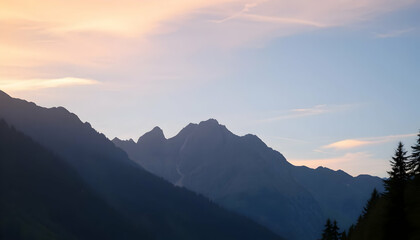 Obraz premium Serene Sunset Over Majestic Mountain Range Peaceful Landscape Breathtaking View Nature Photography