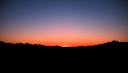 Obraz premium Stunning Desert Sunset Silhouette Dramatic Landscape Photography