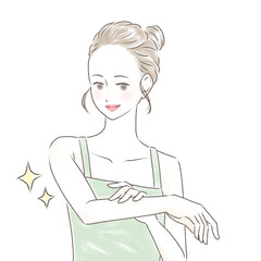 すべすべになった腕を触り喜ぶキャミソールの女性　お団子の髪型