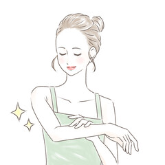 すべすべになった腕を触り、目を閉じて微笑むキャミソールの女性　お団子の髪型