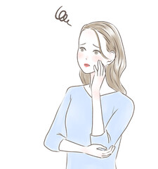 頬杖をついて悩む女性