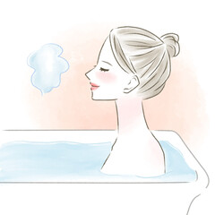 入浴するお団子の髪型の横顔の女性　背景あり