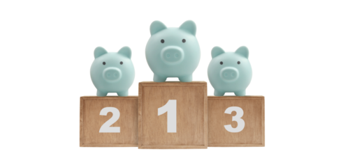 Financial success in saving piggy banks on podium business concept indoor setting close-up view competition in savings