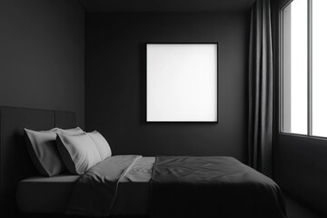 A dark bedroom interior with a blank picture frame and bed