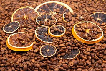 A vibrant close-up of dried orange slices nestled among roasted coffee beans, creating a warm,...