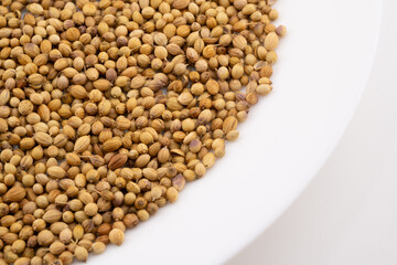 Capture the natural beauty and earthy aroma of fenugreek seeds with this detailed close-up.