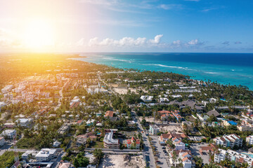 Aerial view on tropical city near caribbean sea seashore