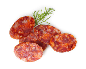 Pieces of delicious dry cured sausage and dill isolated on white, top view