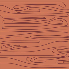 A wooden surface with wavy, sinuous lines or veins.