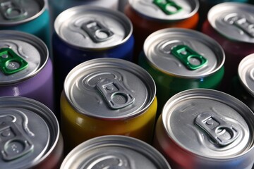 Many aluminium cans of beverage as background, closeup