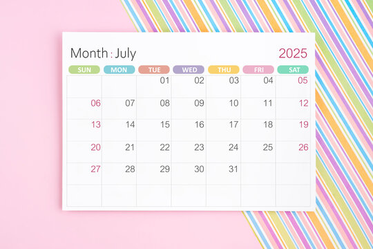 July 2025 calendar page on pink and rainbow background.