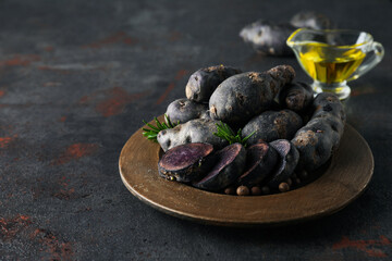 Concept of unusual vegetable - purple potato vegetable