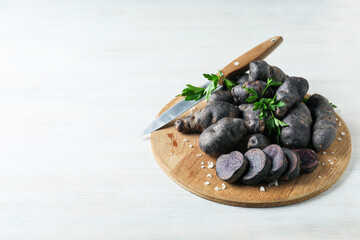 Concept of unusual vegetable - purple potato vegetable