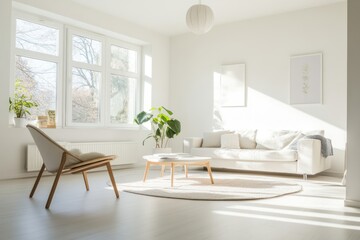 Bright living room with white walls, minimal furniture, and natural sunlight.