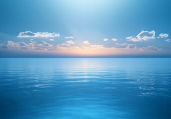 Serene Ocean View at Sunrise with Calm Waters and Soft Clouds Illuminated by Gentle Morning Light