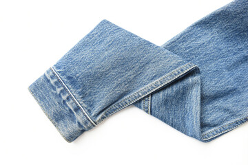 sleeve of blue denim shirt texture isolated on white background, jean fashion style