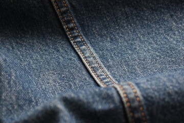 Fototapeta premium seam of blue denim texture background, jean fashion style