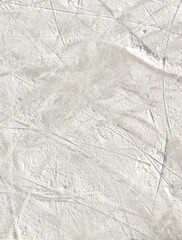 Ice background with marks from skating and hockey. Ice hockey rink scratches surface