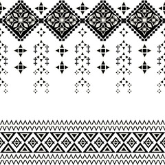 Geometric Native American ethnic seamless pattern in black and white. Tribal vector background. Aztec ornament. Navajo pattern. Vector texture for wallpaper, elaborate borders, textiles, and carpets.