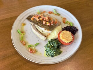 Sea bass steak. Seafood main course. 