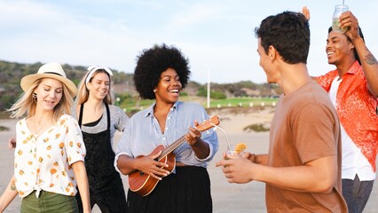 Group of friends enjoying a beach day. Diverse young adults, smiling and dancing. Beach fun, music, and laughter. Relaxed, joyful atmosphere by the sea. Diverse happy adult friend group photography.
