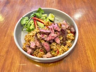 Thai spicy fried rice with beef steak 
