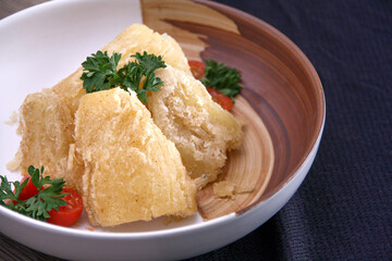 a plate of indonesian snack fried cassava