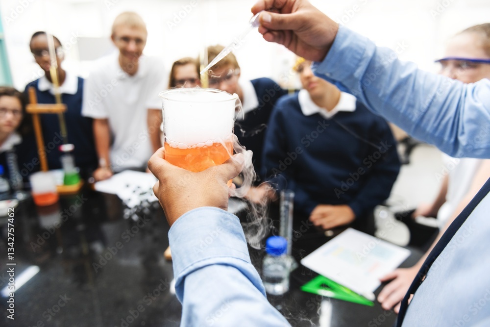 Fototapete Students in a science class observe a chemistry experiment. Diverse group engaged in science. Chemistry experiment captivates students in class. Education, knowledge, and science.