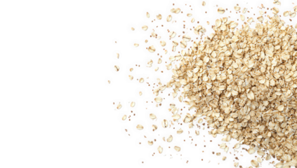 a close-up view of rolled oats scattered on a white background highlighting their texture and color often used in healthy meals or snacks