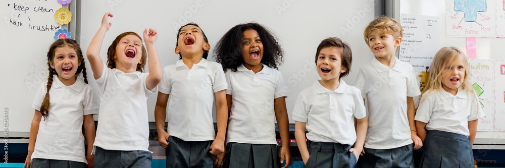Poster group of diverse children in school uniforms laughing and smiling in a classroom. happy kids in unif