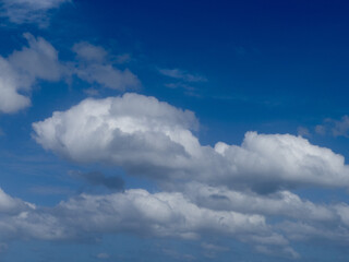 Summer blue sky with white clouds background and texture 