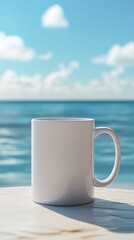 A white mug sits on a table with a serene ocean backdrop and clear blue skies.