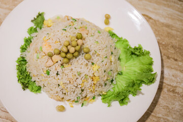 Chinese Food Special Yangchow Fried Rice barbecue pork, shrimp or prawn, onions and peas are added...