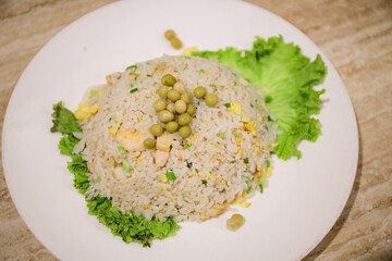 Chinese Food Special Yangchow Fried Rice barbecue pork, shrimp or prawn, onions and peas are added to fried rice cooked with egg