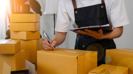 SME businessman checks customer orders online. Starting Small business entrepreneur SME freelance....