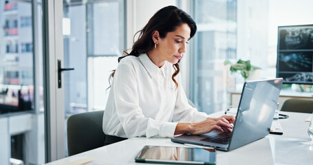 Doctor, laptop and typing with woman in hospital for cardiology, medical or telehealth. Computer,...