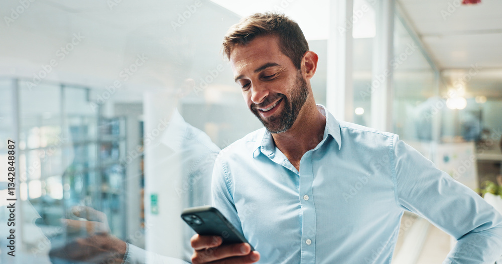 Aufkleber Man, phone and texting by window in office with smile, contact and notification on web at startup. Business person, smartphone or happy with mobile app, social media or networking at creative agency