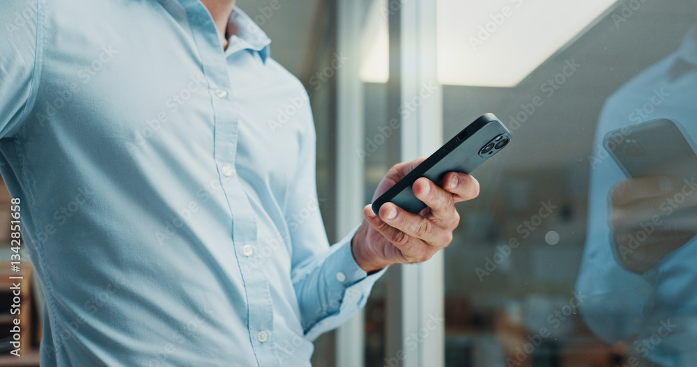 Fototapete Hands, phone and texting by window in office with reflection, contact and notification on web at startup. Business person, chat or click on mobile app, social media or networking at creative agency