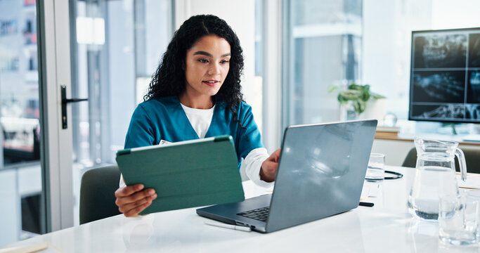 Woman, nurse or research with tablet or laptop for medical study or discovery at hospital. Female person, employee or healthcare worker browsing on technology for telehealth app or results at clinic