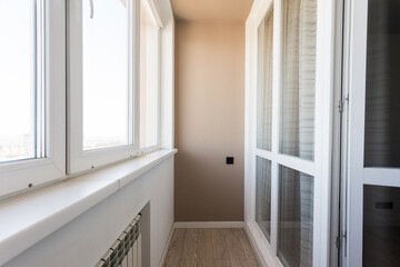 Fototapeta premium the balcony of an apartment on the upper floors of an apartment building