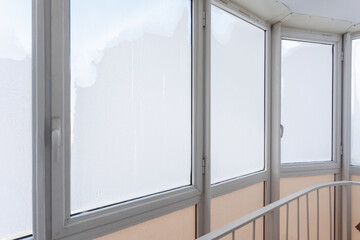 Fototapeta premium the balcony of an apartment on the upper floors of an apartment building