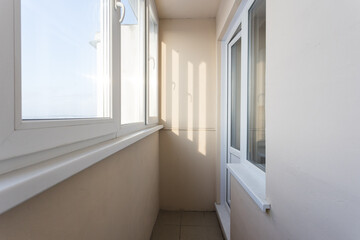 the balcony of an apartment on the upper floors of an apartment building