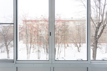 the balcony of an apartment on the upper floors of an apartment building