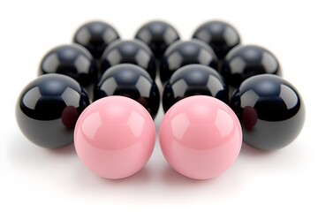 Spheres in rows, pink and black, white background